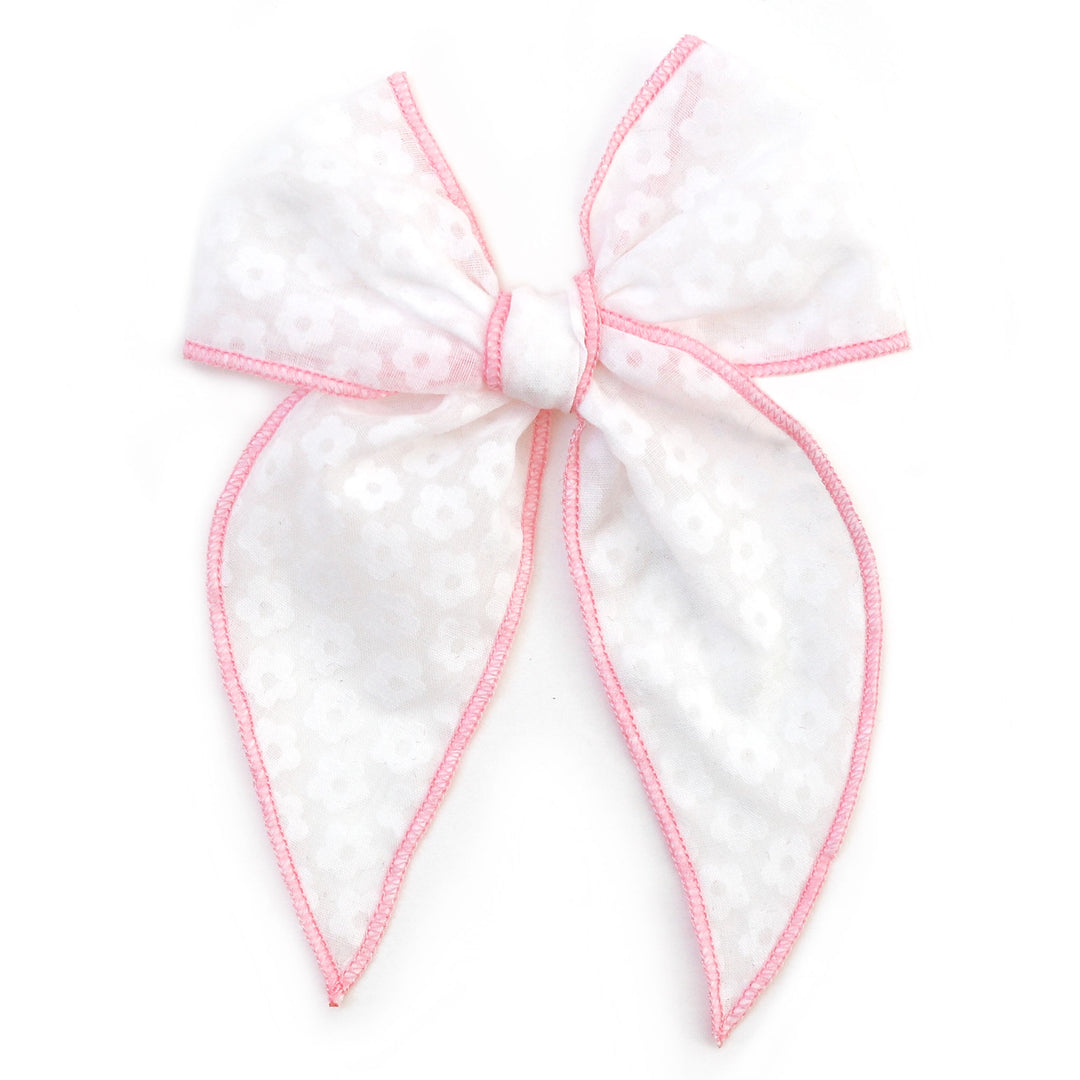 sheer white floral bow with pink trim