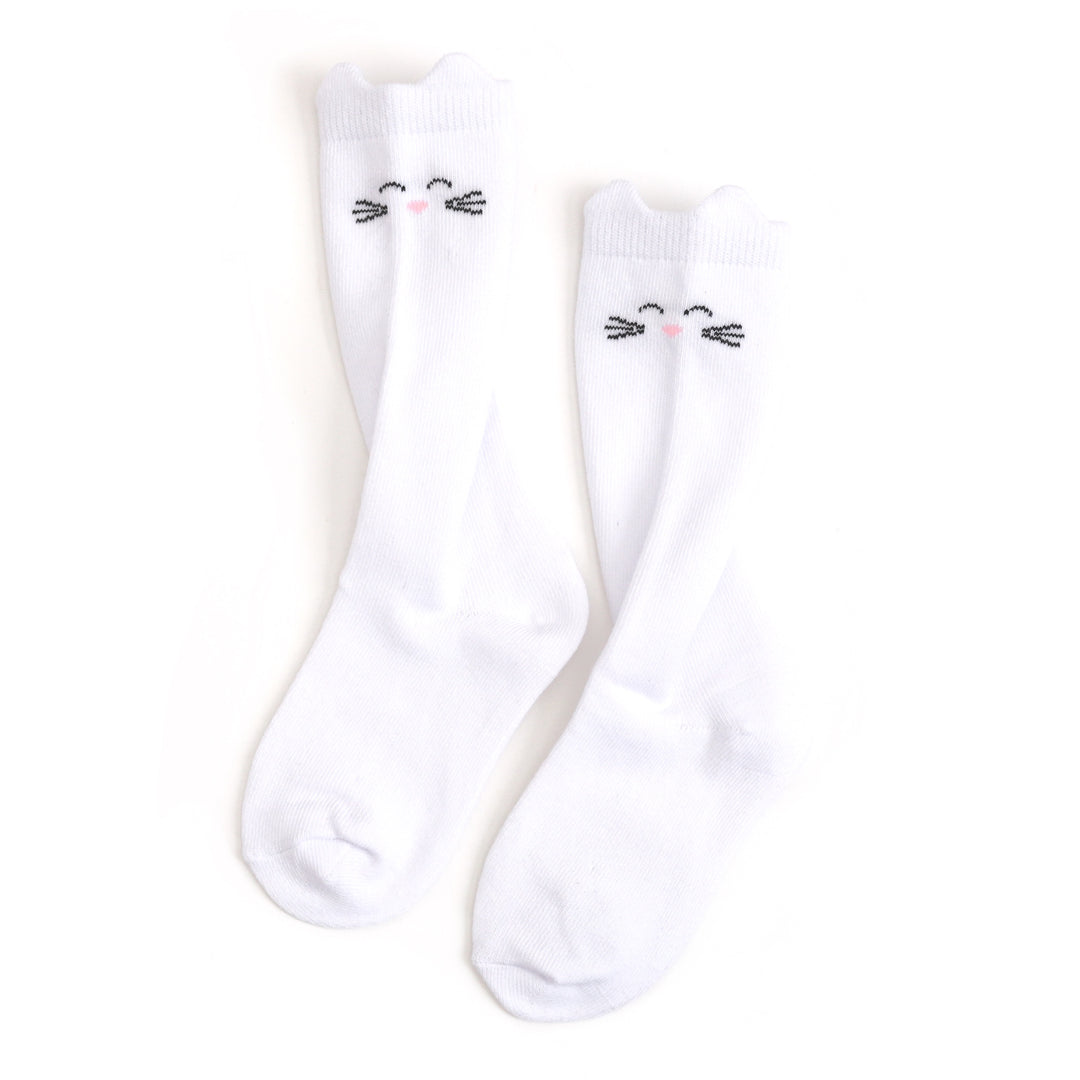 girl's white knee high socks with ears and print of cat whiskers, eyes and nose 