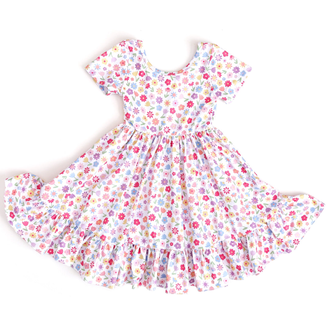 girl's short sleeve white twirl dress with pastel flower print for spring and Easter