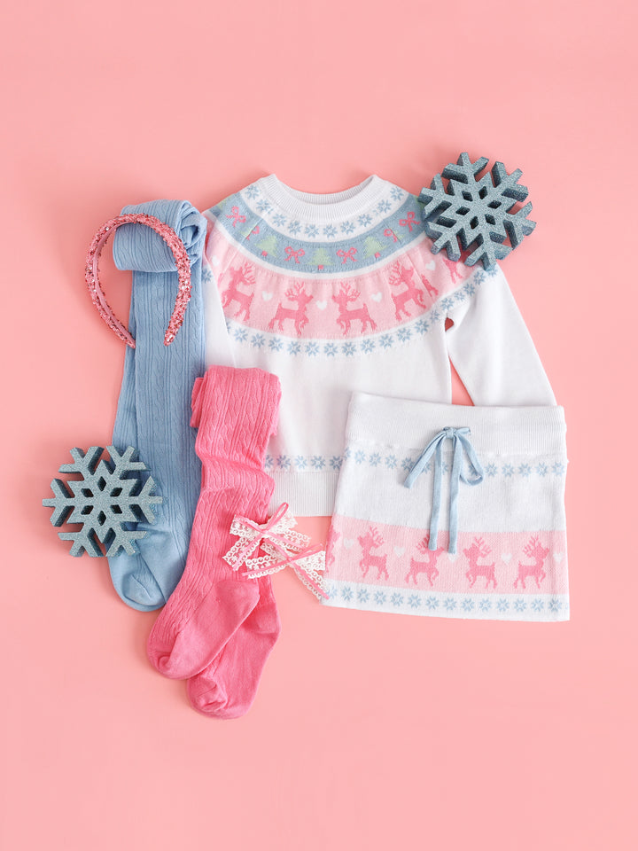 girls' white knit pullover sweater and matching sweater skirt with pink and blue faire isle reindeer print and matching tights and bow parings