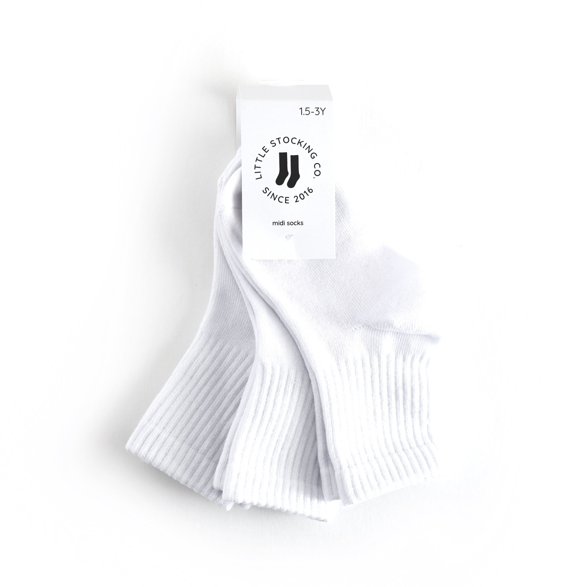 tagged 3-pack of children's white midi length crew style socks