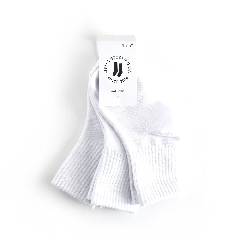 tagged 3-pack of children's white midi length crew style socks