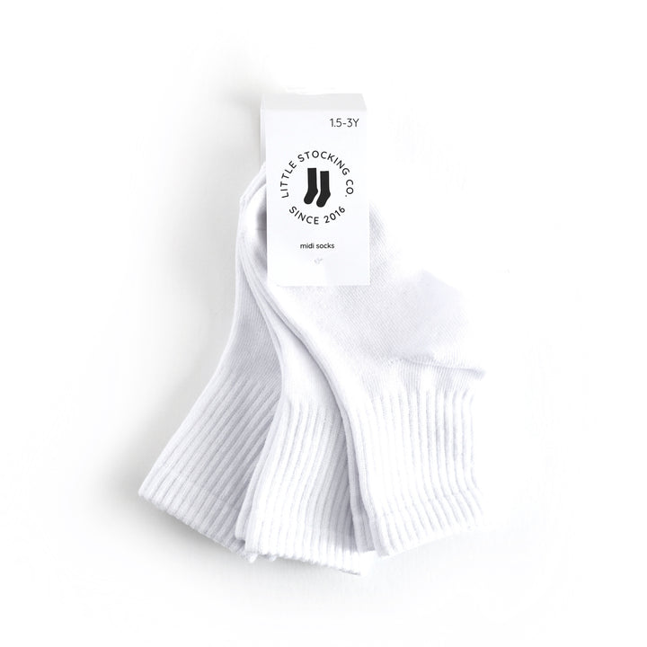 tagged 3-pack of children's white midi length crew style socks