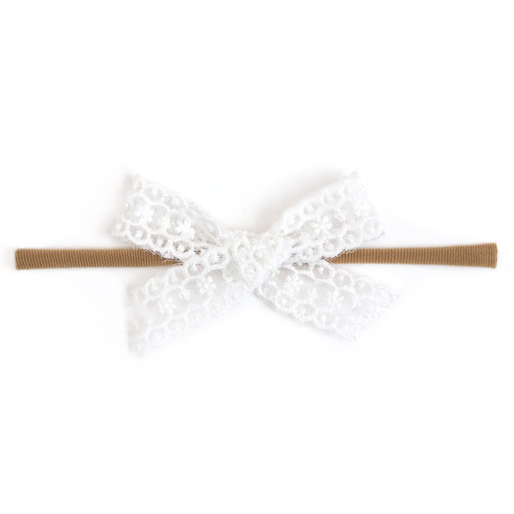 baby girls' white lace hairbow on stretchy nylon headband for spring and easter