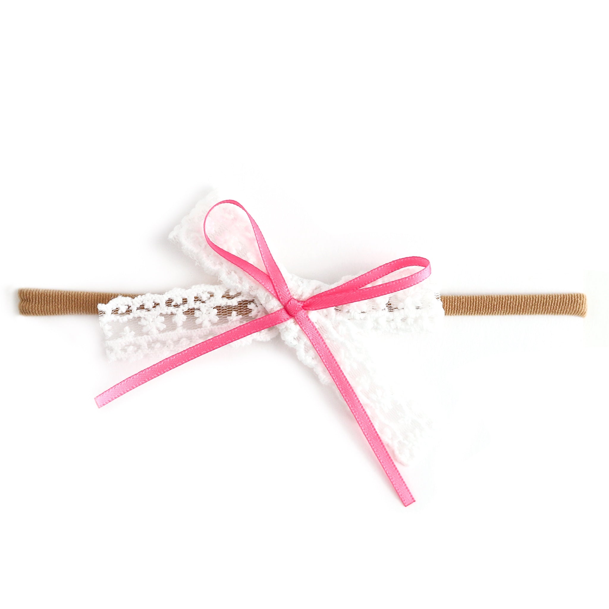 baby girls' white lace bow with pink satin ribbon detail on nylon
