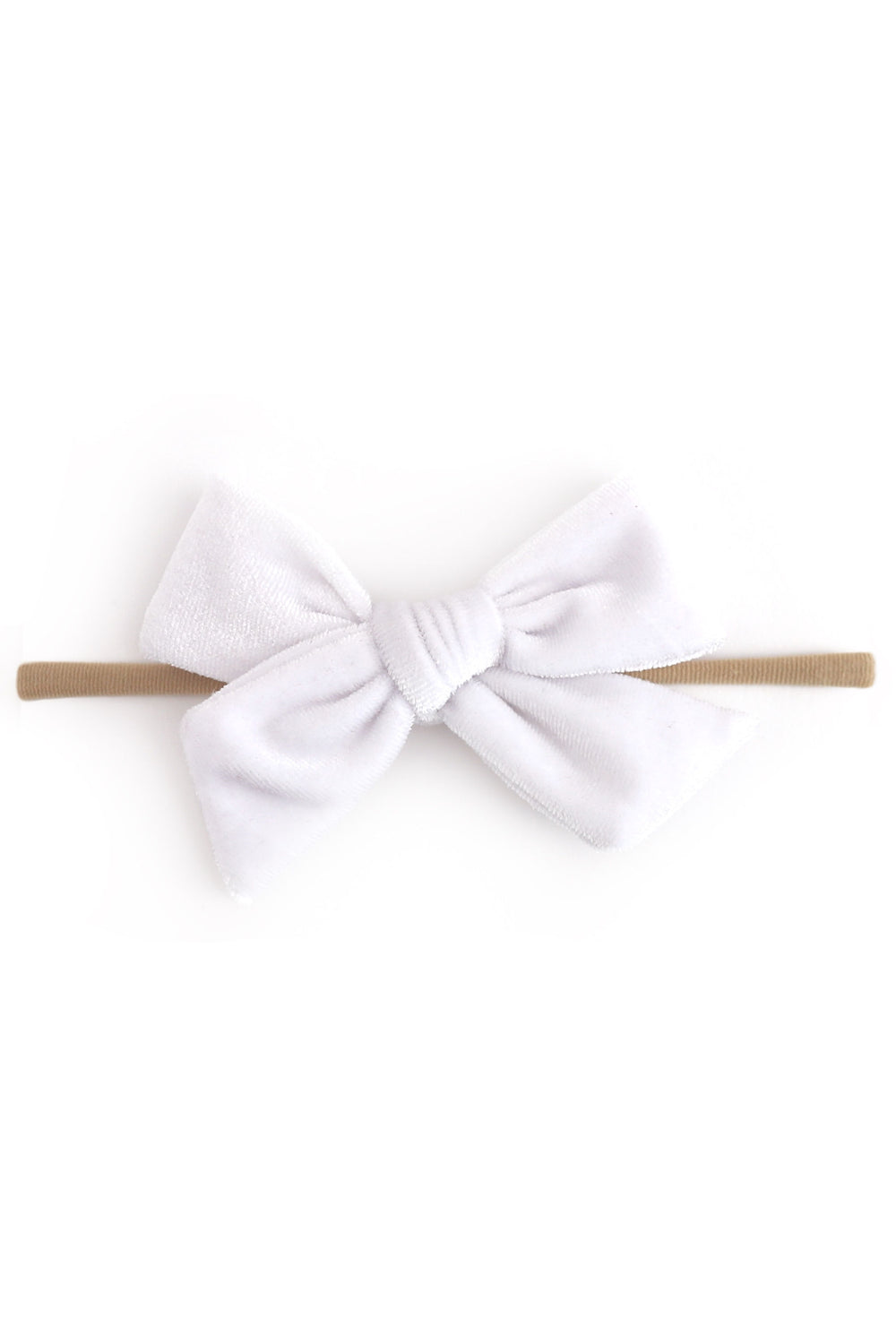 A white velvet baby bow headband on a solid white background.