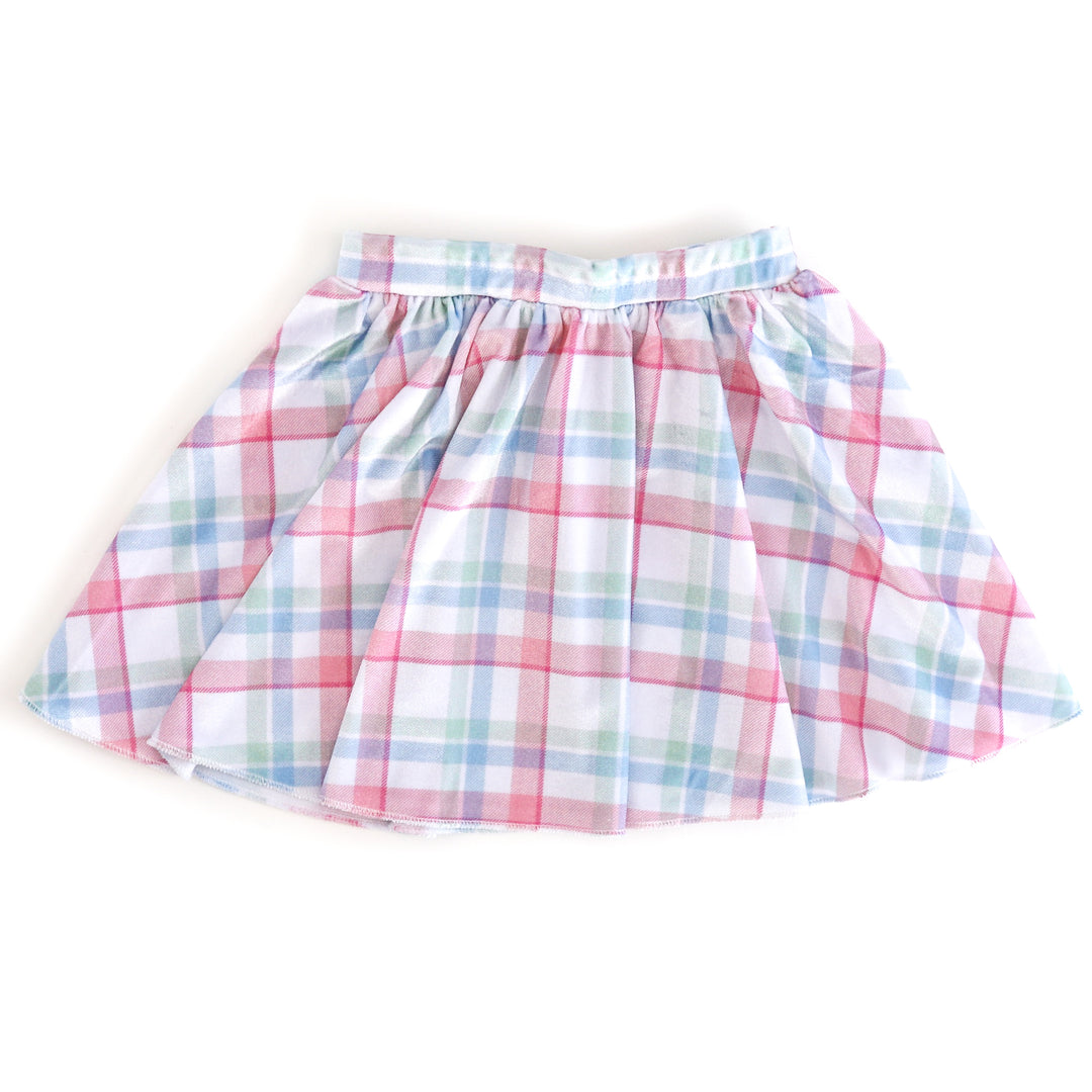 girls' velvet skirt with white base and pink, green and blue pastel plaid pattern 