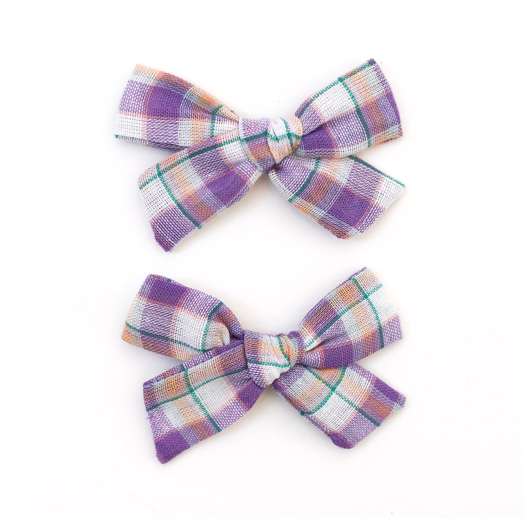 girls pigtail bows in spring purple plaid