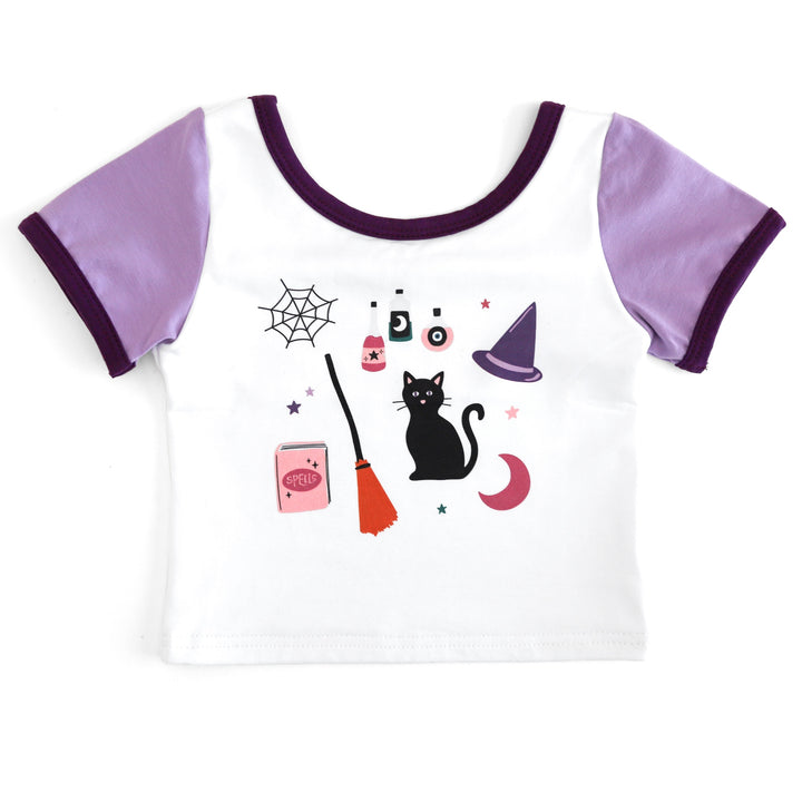 girls' fitted white tee with two tone purple sleeves and binding and witchy themed print for Halloween mix and match
