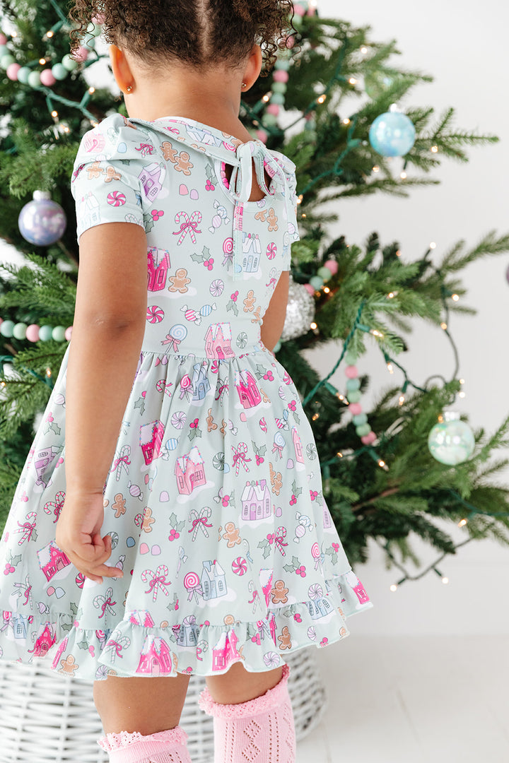 girls pastel christmas dress with gingerbread and candy