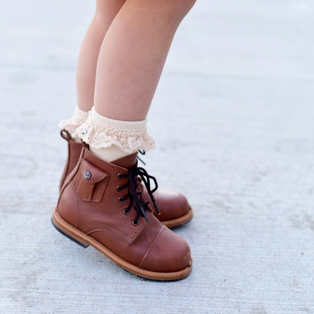 vanilla lace top midi socks paired with brown leather boots